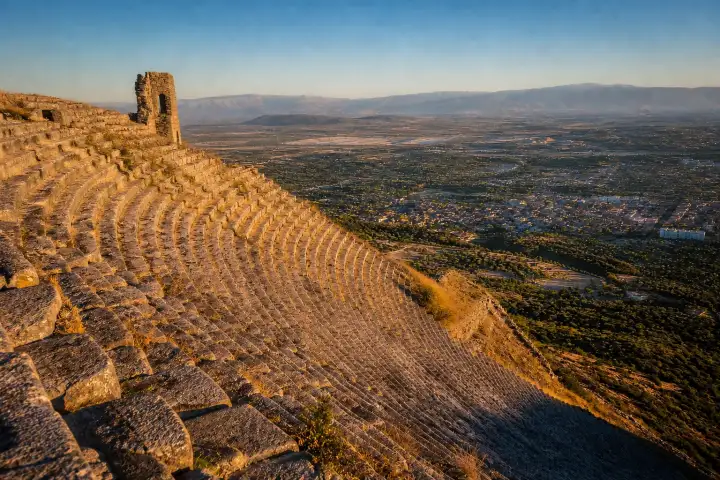 The steep ancient theatre of Pergamon overlooking the Bergama plain at golden hour.