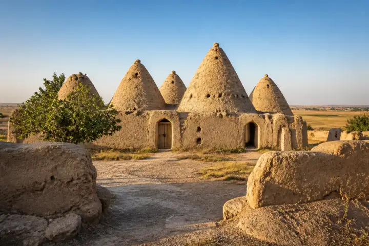 Traditional mud-brick beehive houses on the Mesopotamian plain in Harran, Turkey.