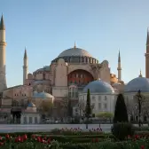 Hagia Sophia above spring tulips in Sultanahmet Square during a quiet Istanbul morning.