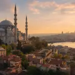 Suleymaniye Mosque above the Golden Horn and historic Istanbul rooftops at sunrise